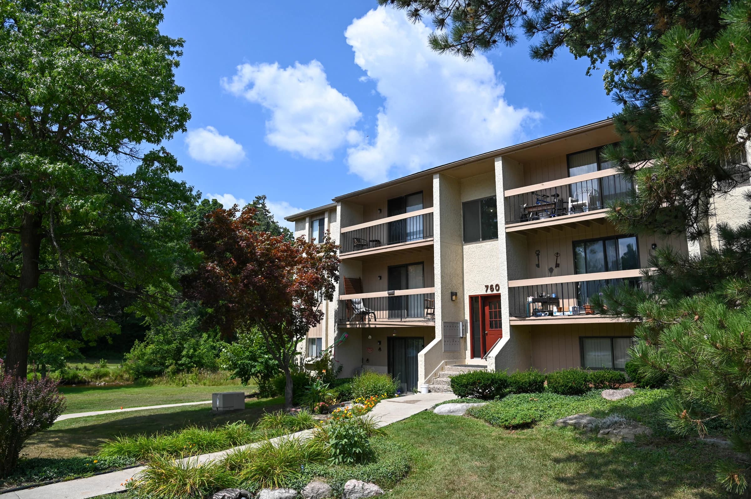 Paint Creek apartment balconies overlooking landscaped grounds